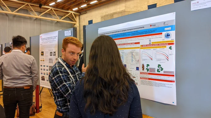 Our PhD Leonard Krupnik presenting his poster at the Swiss Nanoconvention 2022 in Fribourg.
