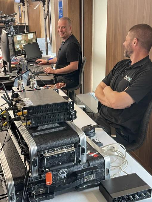 Loads of technical equipment and technicians getting ready to run the hybrid Evolving Cities conference.