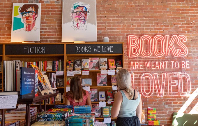 Two shoppers browse in Dog-Eared Books