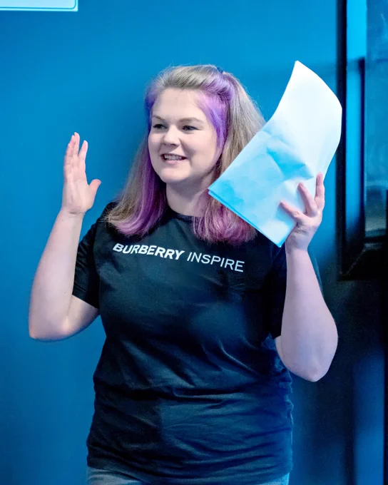 A person holding a piece of paper