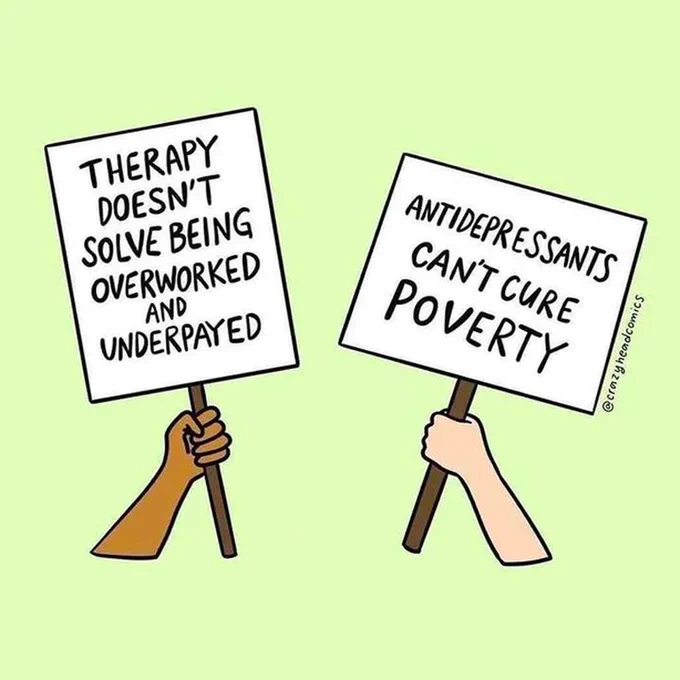 Image

One sign reading: Therapy doesn't solve being overworkerd and underpayed

Second sign reading: Antidepressants can't cure poverty