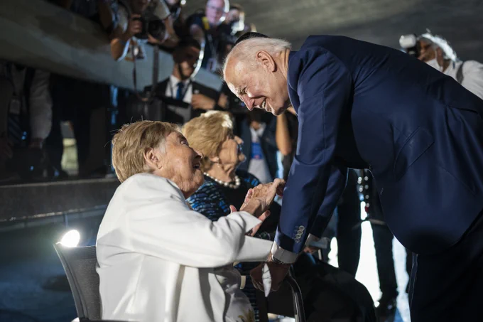 President Biden greets Dr. Gita Cycowicz and Ms. Rena Quint.