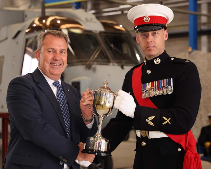 Mr Pete Love presenting The Doc Love Trophy to Sgt Simon Whitby.