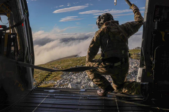 Aircrew in the mountains of Scotland.