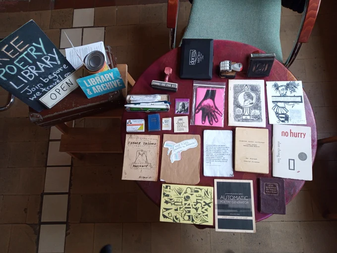Image of The Itinerant Poetry Library open at Perdu bookshop, with the library theme collection of "tiny books for tetchy minds"