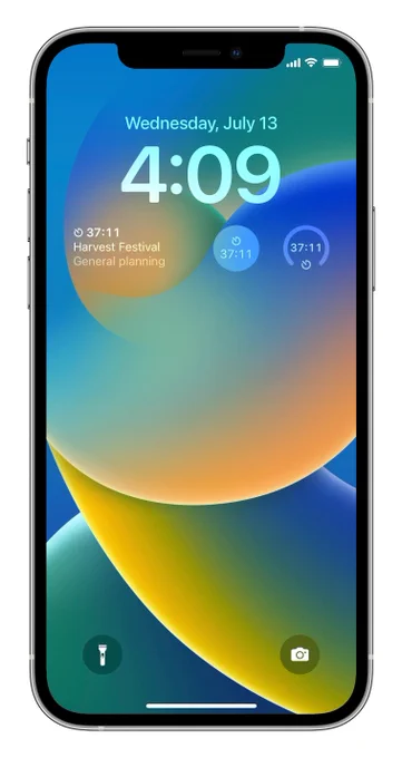 iPhone Lock Screen with three Timery widgets showing the current running time entry underneath the time. The first is a rectangular widget with three lines. On the first line is a small Timery icon with the time entry duration, on the second line is the project name, and on the third line is the description. To the right is a circular widget with the Timery icon and the duration underneath. On the far right is a circular widget with a partial circle outline with a small portion of the bottom cut out to fit a small Timery icon. In the center of the circle is the duration. 