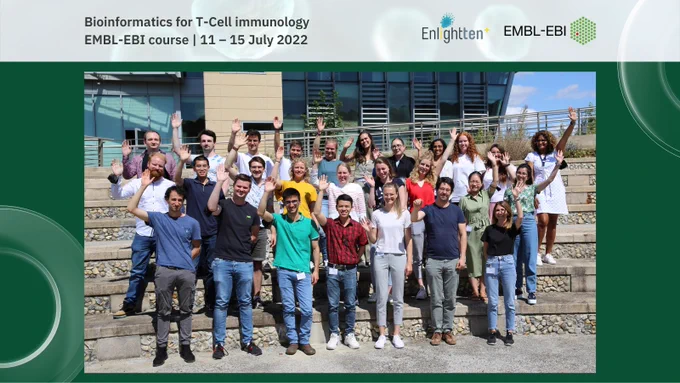 A group of people standing on stone steps with a hand raised in the air each. The words 'Bioinformatics for T-Cell immunology. EMBL-EBI course | 11 – 15 July 2022' are displayed above them with the EMBL-EBI and Enlightten  logos.