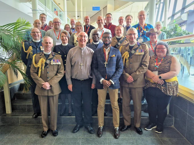 Members of the chaplaincy team to the Armed Forces, and the President and Vice-President of the Methodist Conference stand together.