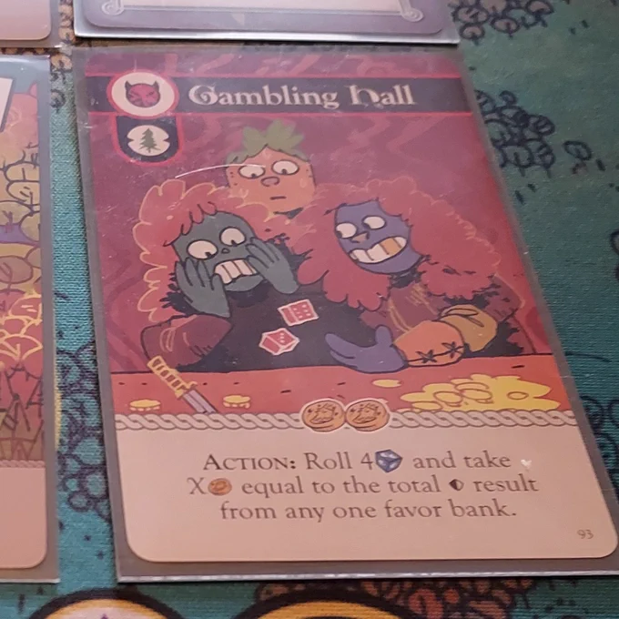 A close-up of the card, showing people with shock and joy