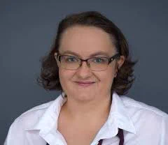 Woman 36 years with doctors coat, glasses, shoulder Long Brown hair