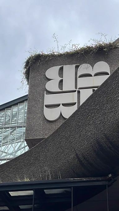 Barbican logo on the brutalist concrete structure