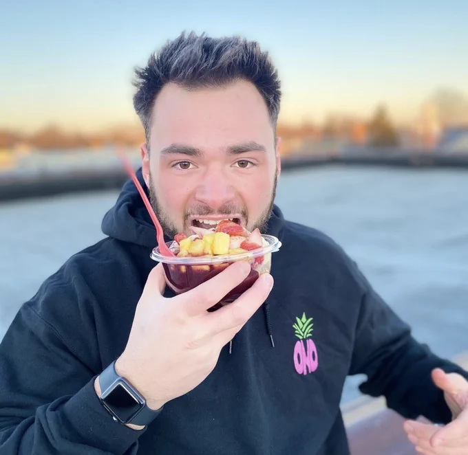 UD student Ben Quinutolo eats an acai bowl. 