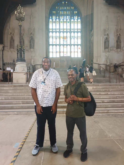 Image: Photo of Franklyn and Miracle standing in Westminster Hall