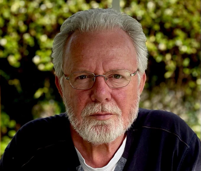 Headshot image of Peter May