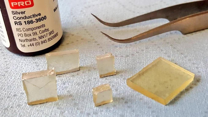 Some polymer samples with tweezers for scale. 