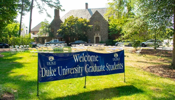 Banner on front lawn of The Graduate School saying "Welcome Duke University Graduate Students"