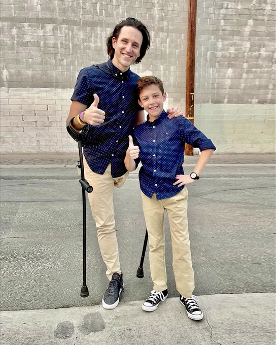 One legged man and boy
