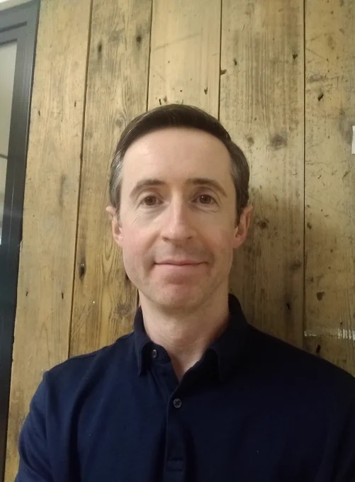 Smiling headshot of Robert