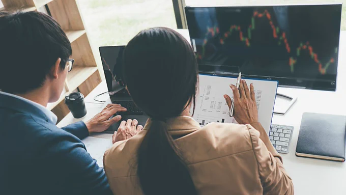Colleagues using data and analytics