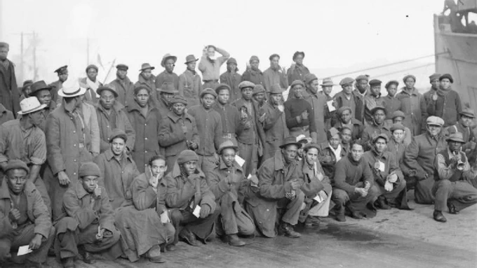 Men from Belize in 1942 landing in Scotland at Greenock ready to be transported to forestry camps in Scotland