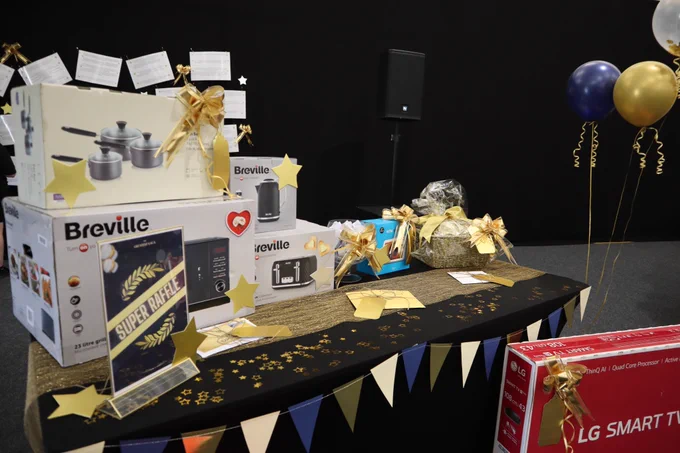 Raffle table with prizes.