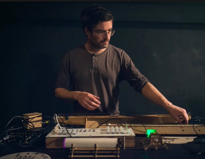 Sound artist pictured at sound desk