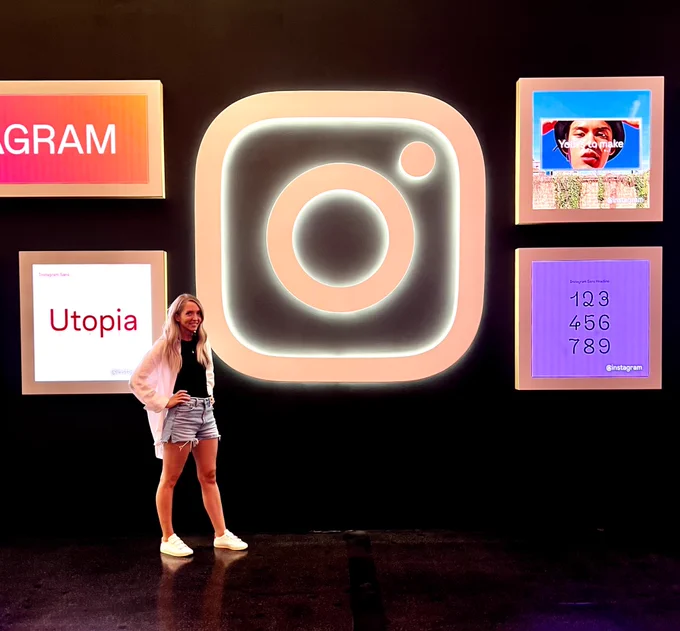Standing in front of a very large Instagram logo