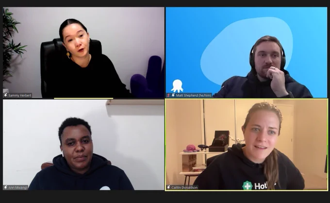 A zoom call screenshot of the panel members speaking at the event.