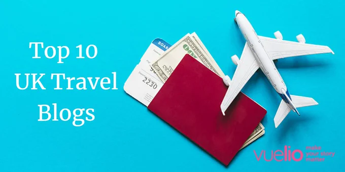 Overhead flatlay photograph of a model airplane, passport, plane ticket and dollars, with the text 'Top 10 UK Travel Blogs' in white font on the left side. The pink Vuelio logo is in the right bottom corner. 