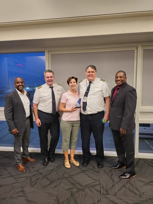 From L to R: LAXFO/Daryel Foster, CA/Robert McCartney, Nancy Walker, FO/Mark Walker and LAXCP/Brian Jackson