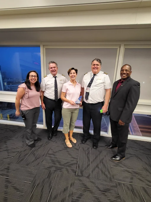 From L to R: ONT UGE Mgr/Erika Berumen, CA/Robert McCartney, Nancy Walker, FO/Mark Walker and LAXCP/Brian Jackson