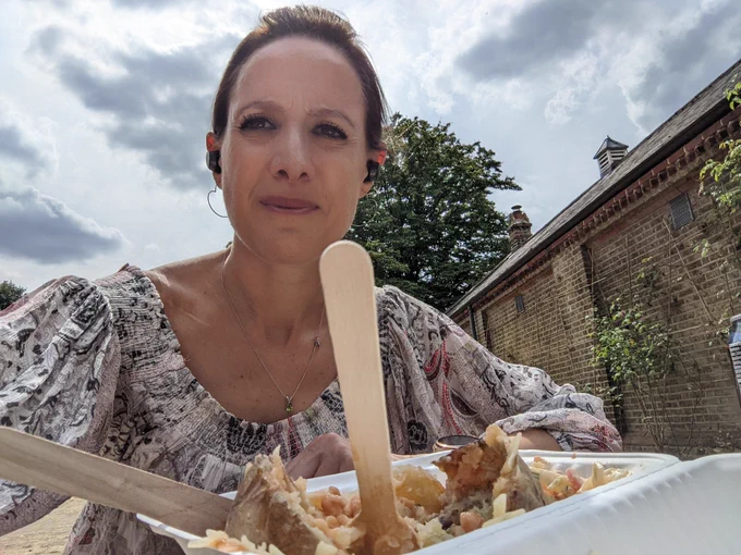 Photo of me with baked potato lunch in the park