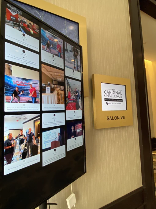 Digital board displaying photos.