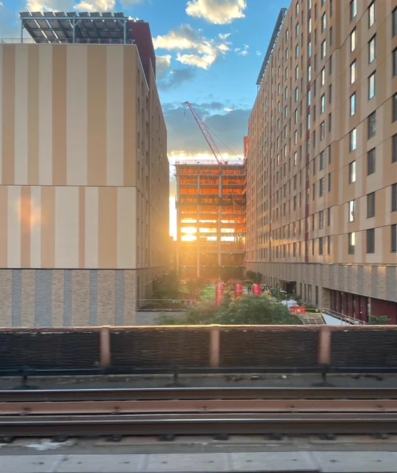 The construction of building A at Sendero Verde during sunset.