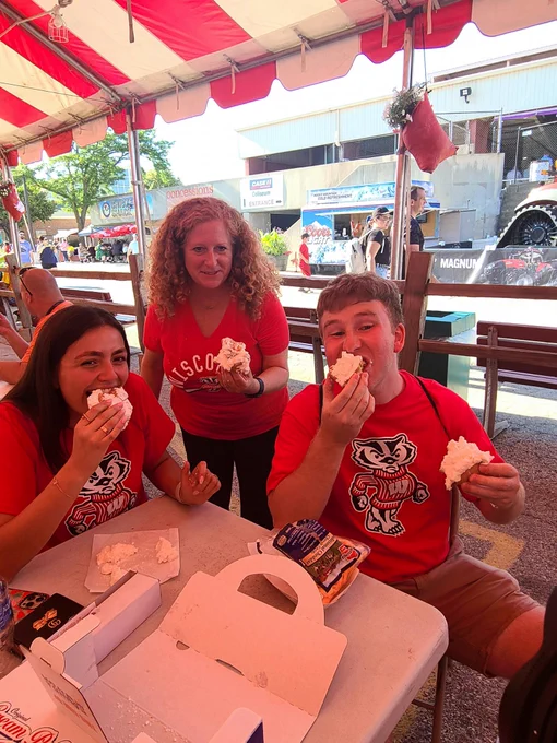 Chancellor Mnookin and Badger Ambassadors with cream puffs