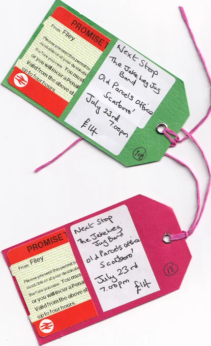Photograph showing the homemade tickets for the event, customised using old suitcase tags and train tickets. 