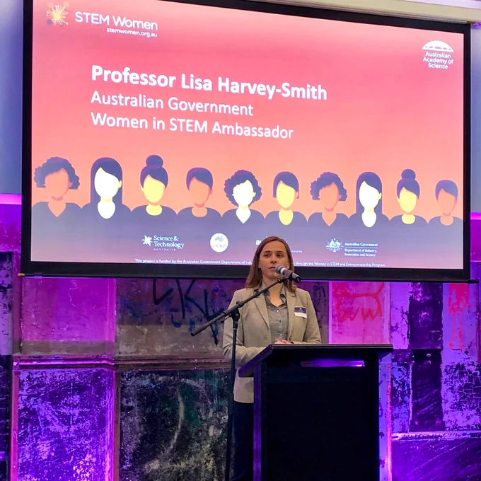 Australia’s first Women in STEM Ambassador, Professor Lisa Harvey Smith, stands on a stage at the launch of the STEM Women database.