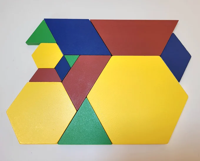 Upscale pattern blocks - 3 sizes each of triangle, rhombus, trapezium (trapezoid) and hexagon in a 1:2:3 ratio, all next to each other