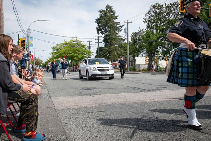 Delta Police Community Police van driving in the Tsawwassen Sun Festival parade.