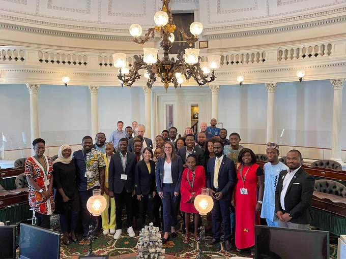 Senator Balint and Representative Krowinski group picture with the 2022 class of Young African Leaders in the Vermont Senate Chamber.
