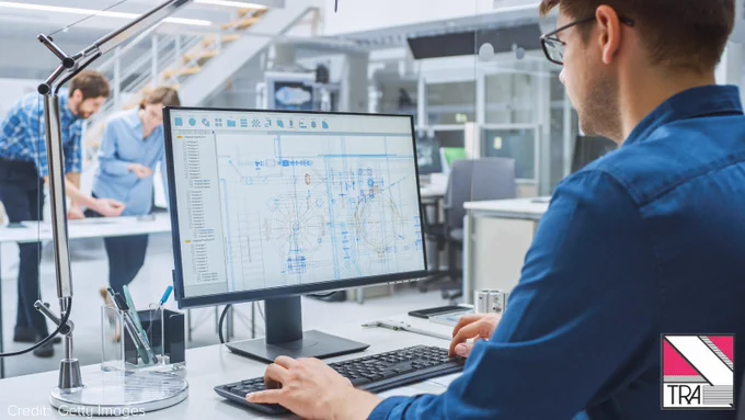 CAD Technician working on the computer