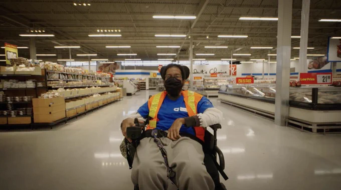 Franklyn navigates through the aisles of the Superstore.