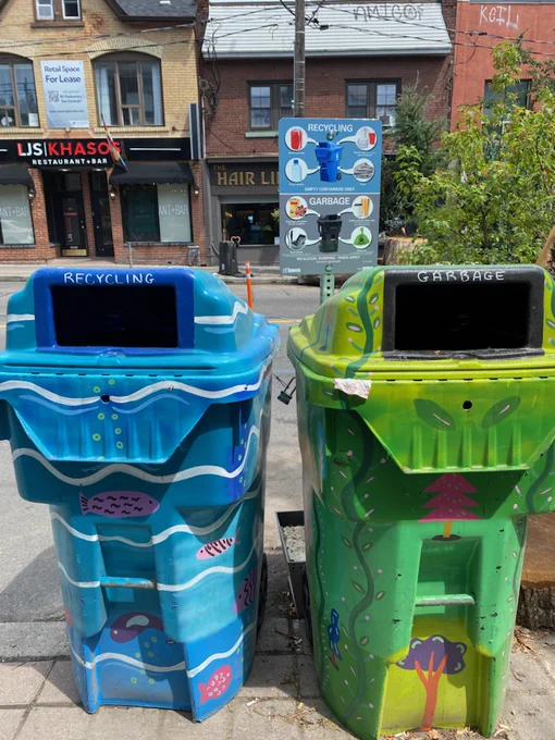 Colourful recycling and garbage bins on a Toronto street