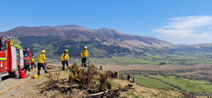 Photo of Cumbria Fire and Rescue Service crews tackling a wildfire incident in 2021.