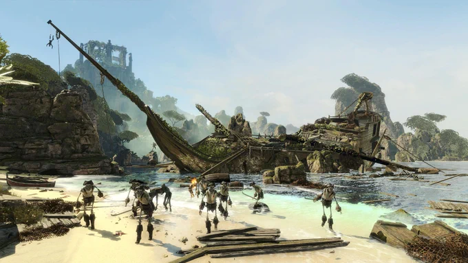 A shipwreck in Isle of the Dead, DLC for Strange Brigade - zombie pirates are making their way out of the water and up on to the sandy beach. A ruin can be seen on a hill in the foggy background.