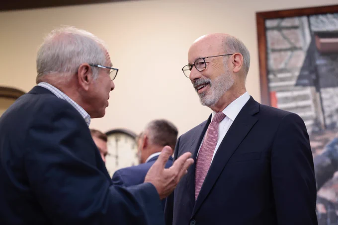 Governor Wolf speaking with someone