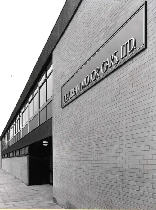 B&W photograph of the outside of the DeLorean factory in Dunmurry