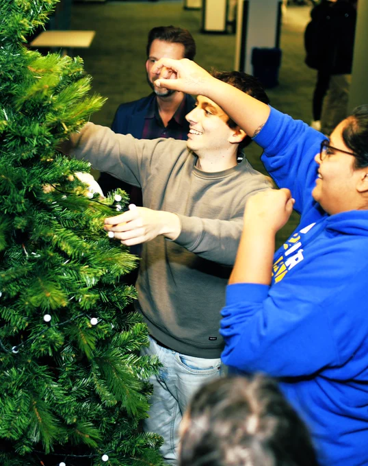 Yusu sabbs decorate the tree of wishes with elan