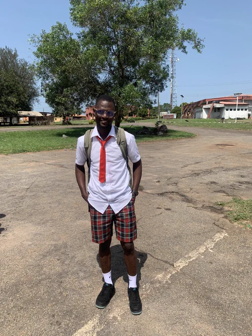 Oluwaseun with the white teeth smiling.