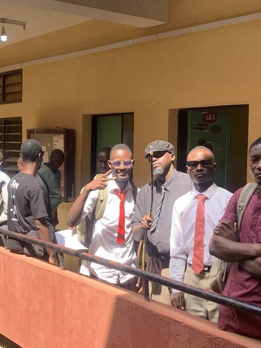 Oluwaseun with class teachers